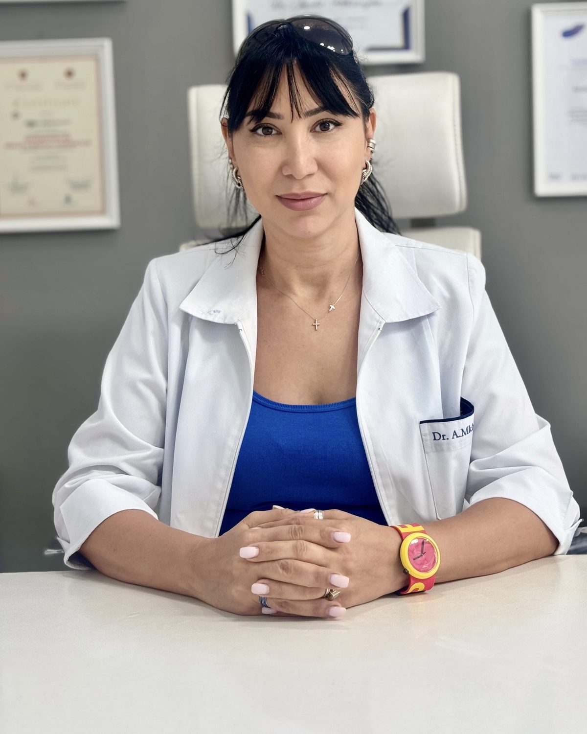 Dr Anahit Mkhitaryan at her desk in the clinic